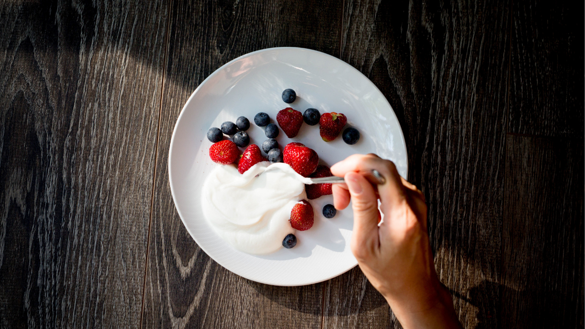 Should You Dump or Stir in That Liquid on Top of Your Yogurt? One Way Is Much Healthier