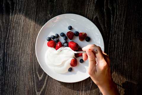 Should You Dump or Stir in That Liquid on Top of Your Yogurt? One Way Is Much Healthier