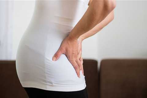 Why back pain in early pregnancy?