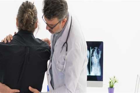 When should you go to the doctor for a back injury?