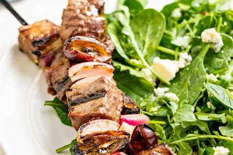 Grilled Steak Kebabs with Spinach Blue Cheese Salad